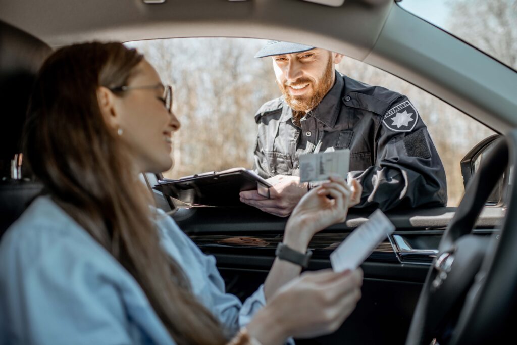 woman getting pulled over by the police